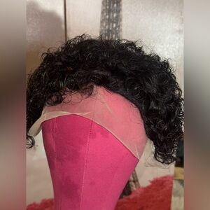 Short curly black hair lace front wig. Human hair. Comes with free with tripod.